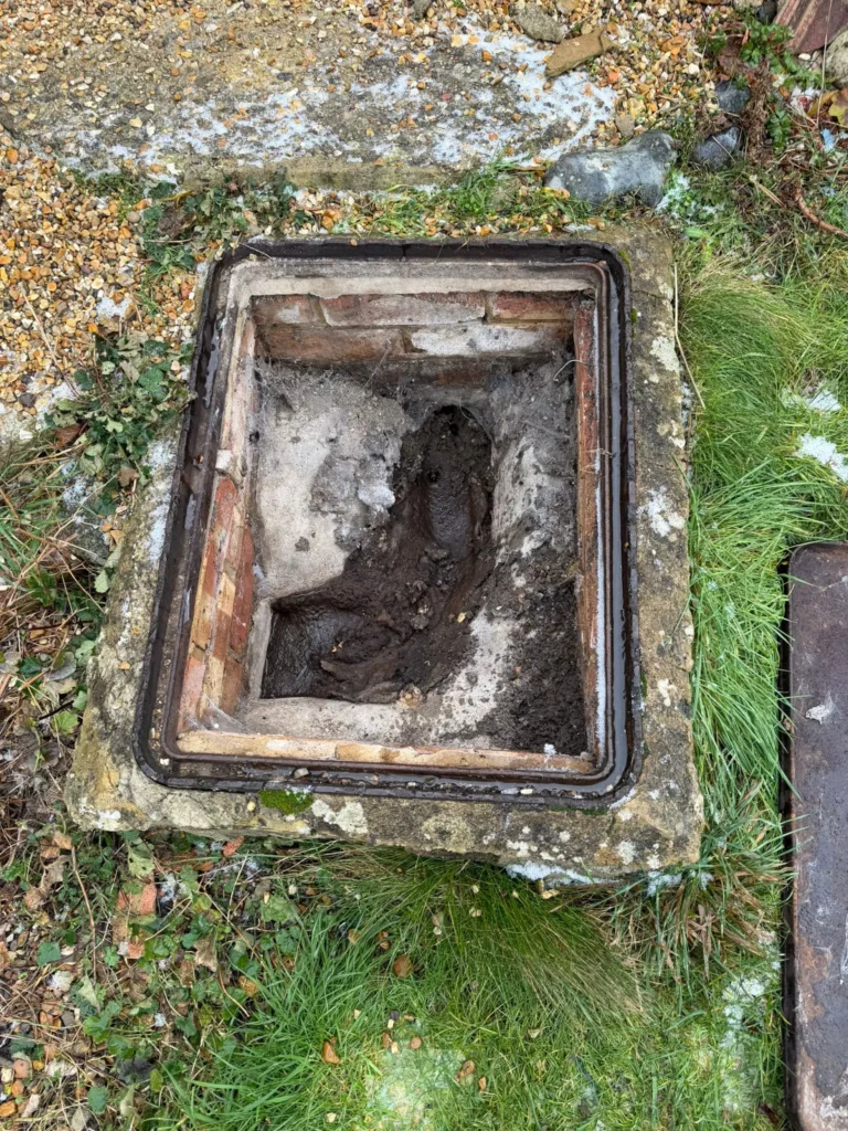 Blocked drain showing sewage - Knebworth